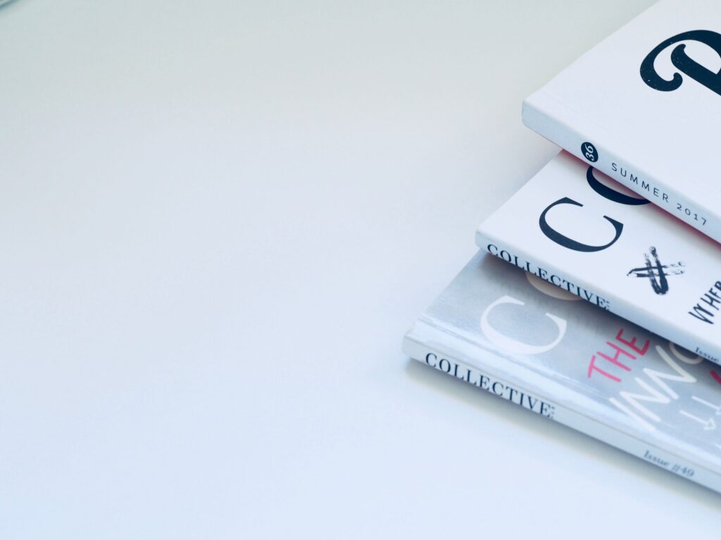 Stack of magazines and journals, representing research literature