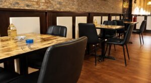 Table seating area at The High Lounge cannabis social club in Los Montesinos