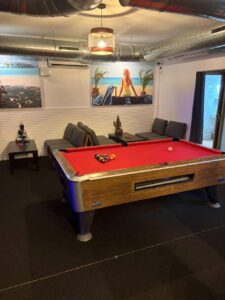 Lounge and pool table inside Smokey CSC Cannabis Social Club Los Montesinos