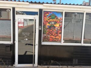 Smokey CSC Cannabis Social Club Los Montesinos storefront entrance