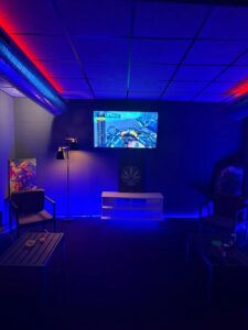 TV lounge area inside Smokey CSC Cannabis Social Club Los Montesinos